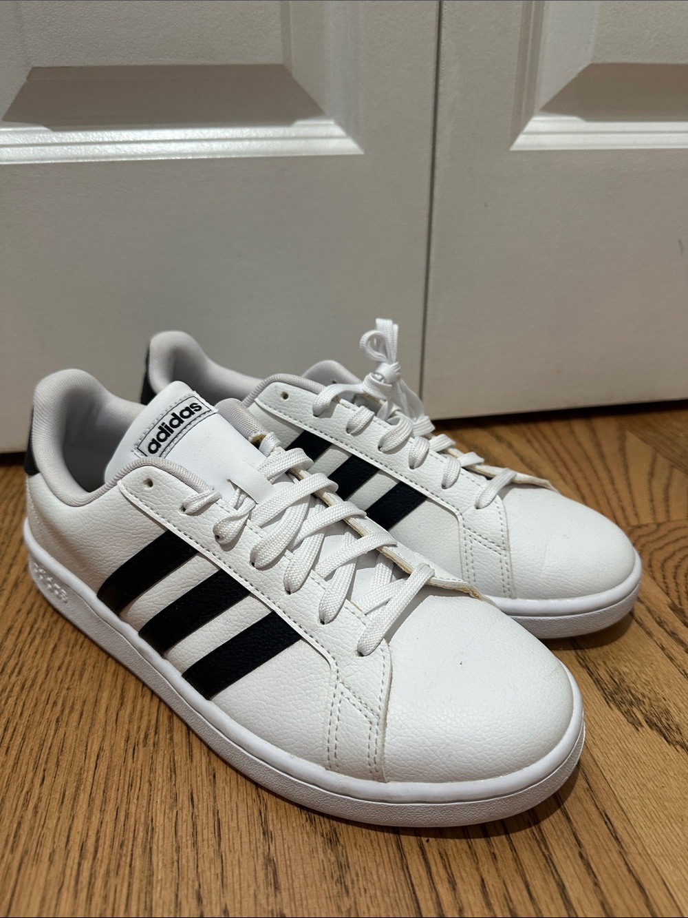 Adidas White Sneakers with Black Three Stripes - Women